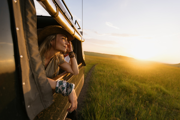 lady looking out of a car on safar